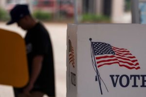 A person casts their vote during the early voting process at a voting station ahead of the upcoming 2024 U.S. presidential election on October 27, 2024 in Los Angeles, California.