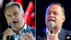 FILE -The combined image shows the leftist candidate Yamandú Orsi of the Frente Amplio (left) on October 22, 2024, and his opponent, the candidate of the ruling National Party, Álvaro Delgado, on November 20, 2024, both in Montevideo, Uruguay.