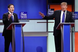 Then-Republican presidential hopefuls Senator Marco Rubio (left) and Donald Trump (right) participate in a debate sponsored by Fox News at the Fox Theater on March 3, 2016 in Detroit, Michigan.