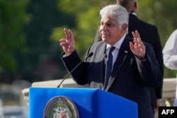 Panama's President José Raúl Mulino delivers a speech during the ceremony to commemorate the 25th anniversary of the delivery of the Panama Interoceanic Canal by the United States to Panama, in Panama City on December 31, 2024.