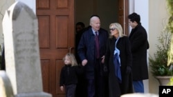 President Joe Biden, first lady Jill Biden, and grandson Beau Biden leave Brandywine Catholic Church in Wilmington, Delaware, Wednesday, Dec. 18, 2024.