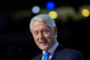 Bill Clinton hospitalized with fever, but in good spirits, says spokesman