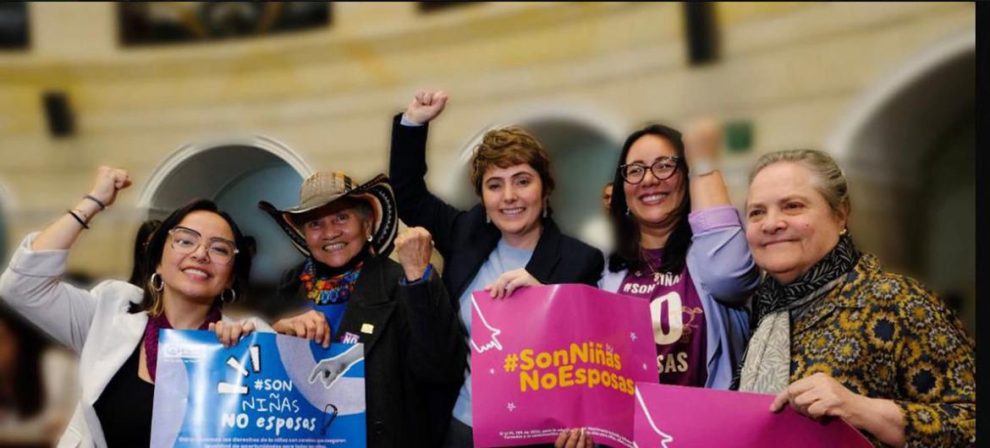 Activists celebrate the elimination of child marriage in the Colombian Parliament.