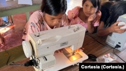 Sewing class taught by Corina Landaez and aimed at Pemona girls in the Canaima National Park.