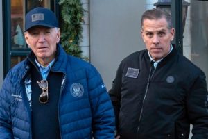 President Joe Biden and his son Hunter Biden walk in downtown Nantucket, Massachusetts, on Nov. 29, 2024. Credit: Jose Luis Magana/AP