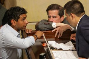 Minister of the Interior Juan Fernando Cristo speaks with representatives David Racero and Carlos Ardila