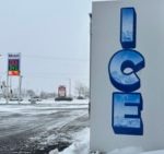 A convenience store's ice bin is a sign of the times on a windy winter day in Bismarck, N.D., Thursday, Dec. 19, 2024. (AP Photo/Jack Dura)