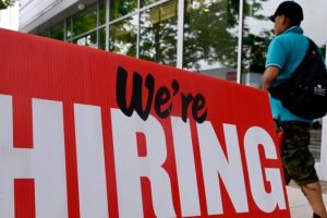 US job growth accelerates in November; unemployment rate rises