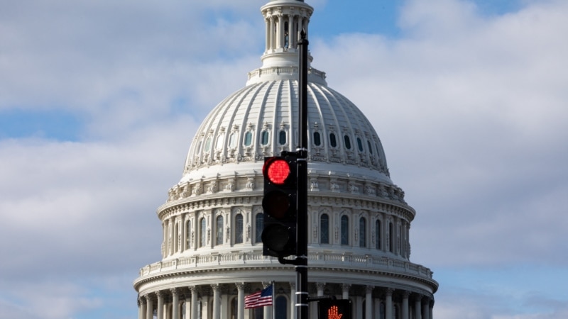 What is a partial US government shutdown and what is the debt ceiling?