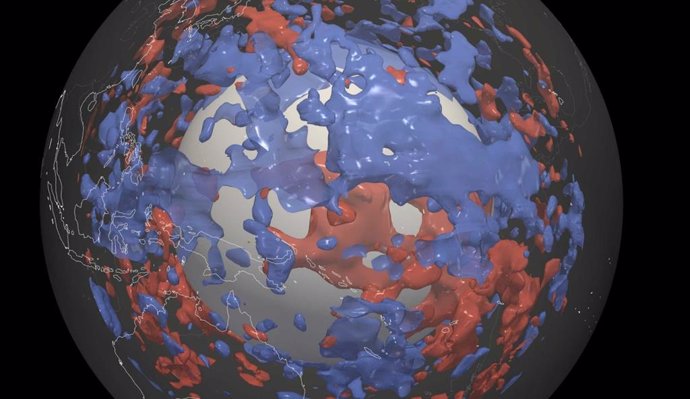 Using a new model, researchers discover areas in Earth's lower mantle where seismic waves travel slower (in red) or faster (in blue). The great blue area in the western Pacific (just over the center of the image)