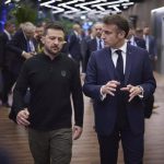 File - Ukrainian President Volodymyr Zelensky and his French counterpart Emmanuel Macron.