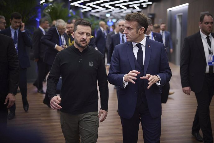 File - Ukrainian President Volodymyr Zelensky and his French counterpart Emmanuel Macron.