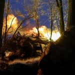 A Ukrainian National Guard serviceman fires a howitzer at Russian troops at a front-line position in the Kharkiv region.