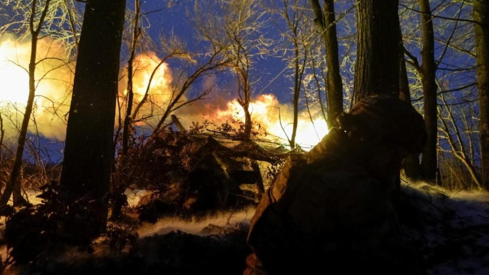 A Ukrainian National Guard serviceman fires a howitzer at Russian troops at a front-line position in the Kharkiv region.