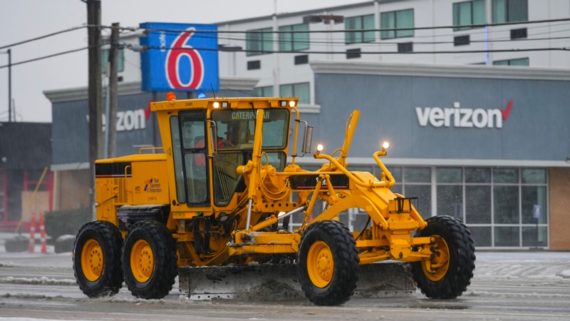 Strong winter storm causes flight cancellations and closes schools in the southern US