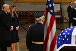 Trump appears to pay tribute at Jimmy Carter's coffin at the Capitol