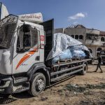 A truck loaded with humanitarian aid crosses the Gaza Strip